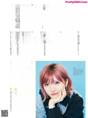 A woman with pink hair is featured in a magazine.