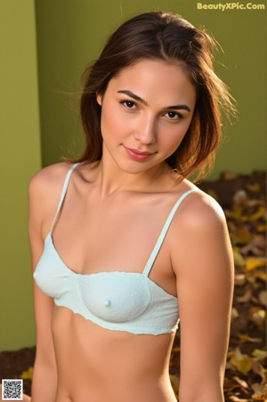 A woman in a black lingerie posing in a bedroom.